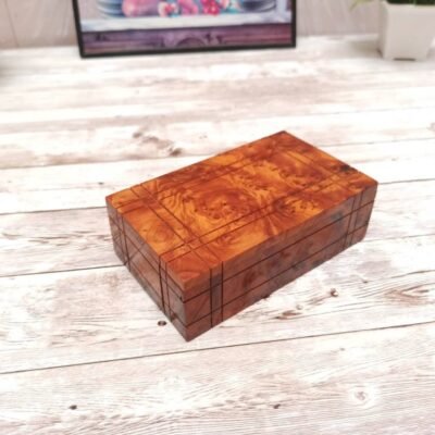 Boîte à bijoux en bois avec ouverture secrète